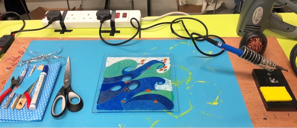 Participant Lorraine England’s reverse glass painting, ready to add the solar cells